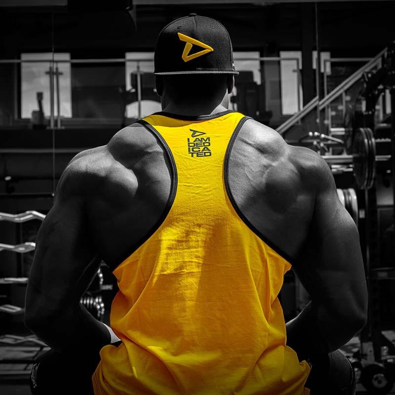 Dedicated Stringer (Yellow Back) Dedicated Logo